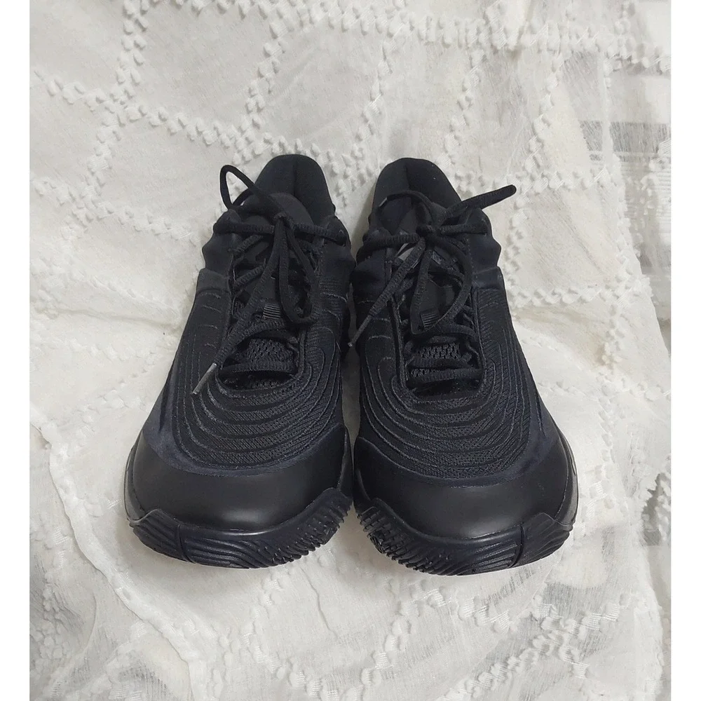 Nike Giannis Immortality 4 basketball shoes in a triple black